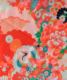 8101 1980s deadstock cotton Colorful fabric with a crane and floral design on a pink background