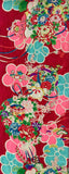 8129: 1930s Japan Ceremonial GIrls kimono deadstock silk fabric:  of a Japanese-style floral fabric pattern on a deep red background, featuring large pink and turquoise flowers with smaller multicolored blossoms and green leaves