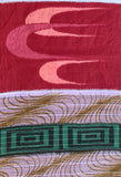 8132: Bottom view, 1950s Cotton Meisen close up view of a patterned textile featuring a burgundy-red background with swallows stylized in flight; with pink abstract wave motifs, white bands, and green geometric medallion accents with gold wavy lines.