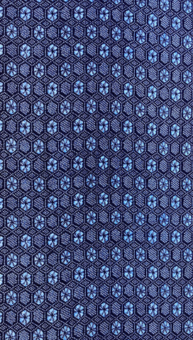 81332: 1960s Japanese Yukat a Cotton,  1 yard view, cleaned, A close-up of a  fabric with a repeating geometric hexagonal design.