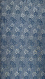 81392:1960s Rinzu Kimono Silk, A  middle close-up of a blue patterned fabric with a repeating chrysanthemums motif in lighter and darker blue tones.
