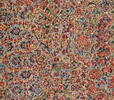 8150: closeup 1980s Japanese chiriment silk, yosegire floral patterned fabric with dense small motifs in red, blue, beige, and brown tones.