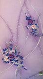 8152; jSilk  close-up of a lavender purple fabric featuring an elegant Japanese-style floral print with peonies in shades of purple and pink, wisteria, and dark blue leaves, accented by cream-colored rope-like lines; certified seal 100% Japanese silk