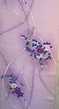8152; Silk  close-up 6 second pair of flower clusters;Japanese-style floral print with peonies in shades of purple and pink, wisteria, and dark blue leaves, accented by cream-colored rope-like lines.
