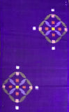 81582:1930s Japan Meisen Silk Hanabishi close-up2 of a purple textile or fabric with two matching geometric motifs near the top-left and bottom-right. Each motif contains small colored squares and curved shapes in pink, orange, yellow, green, and lavender on a purple background.