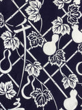 7938: mid view bamboo fence, leaves, gourds. kanji for 'sen'