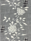 7938: floral deisgn with stems leaves closeup
