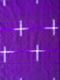 Purple fabric with a grid pattern