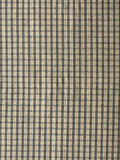 Textured fabric with a checkered pattern in beige and light black ones.