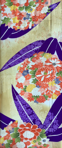 8082: 1940s Japanese Decorative kimono silk fabric with floral patterns and purple accents on a beige background