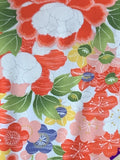 8082: Colorful floral pattern with red, green, and blue flowers on a light background