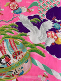 8103-1930s Japanese Silk Colorful fabric with embroidered design featuring a dove, flowers, and patterns on a pink background.