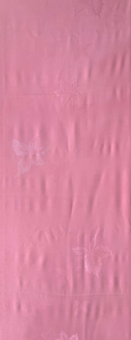 81131: 1980s Japan Kimono Silk 61inches view of a pink textured fabric with subtle tonal floral patterns.