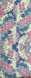 8116 1980s Japan Tsumugi Silk, full-length view  a floral fabric pattern featuring pink, purple, and blue flowers with green leaves on a pale yellow background.