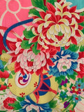 8130: close-up flowers, cords, drum 1930s Japan Ceremonial GIrls kimono deadstock silk fabric:  of a Japanese-style floral fabric pattern  with tsuzumi drum on a vermillion shuiro  background, featuring large pink and turquoise flowers with smaller multicolored blossoms and green leaves