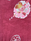 7102:  close, note interwoven designs